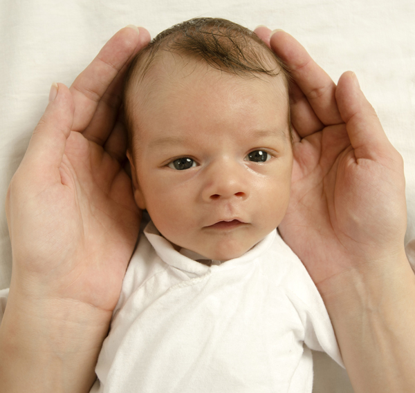 Positioning baby to prevent a flattened head shape Plagiocephaly